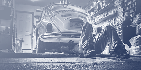 Mechanic working on a car in their workshop